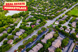Multiple houses birds eye view looking at an estate of properties.